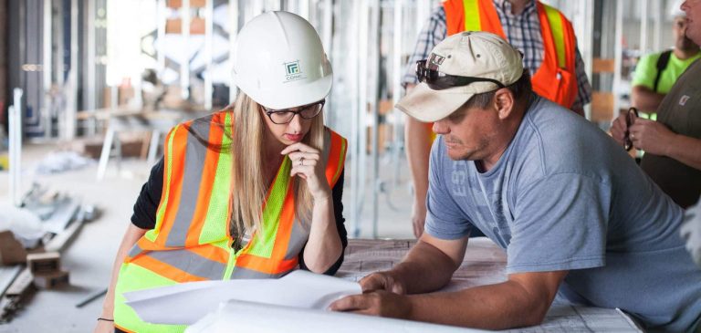 safety-consultant-with-builder-scaled